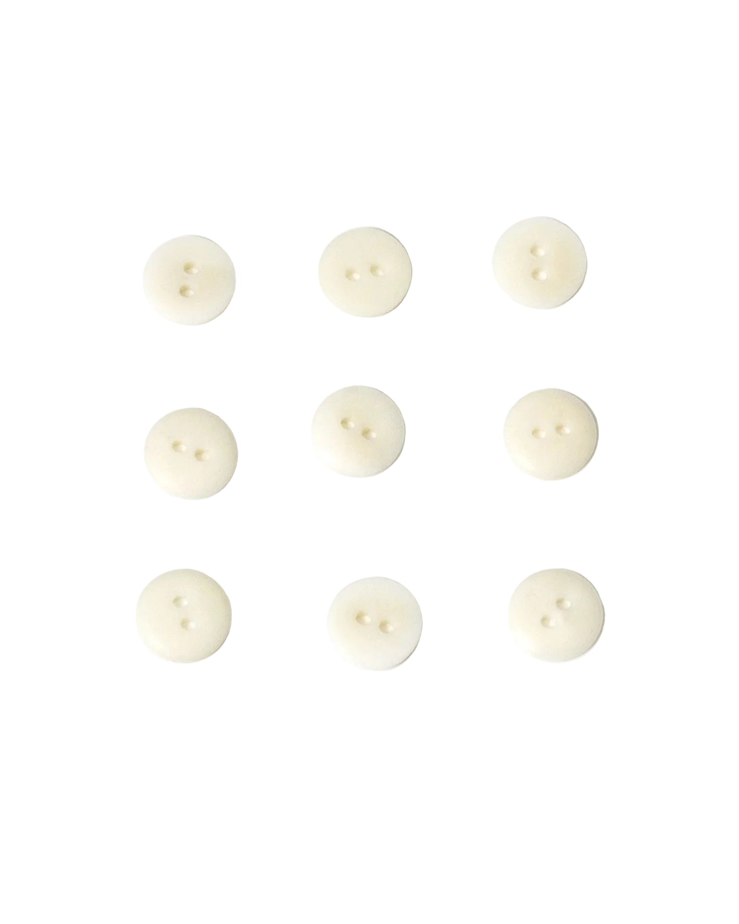 White buttons arranged in a grid on a white background